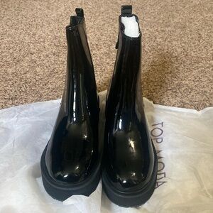 Black rain boots by Top Moda